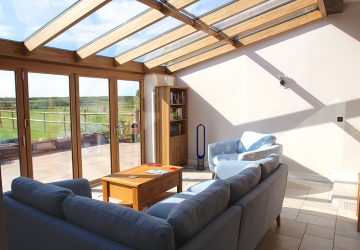 Solid Oak/Aluminium Solarlux bifold and wintergarden glass roof