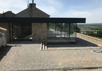 Glass Box Extension with cero sliding doors