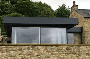 Glass box style extension with Cero slim-profile sliding doors