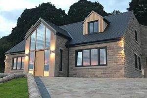 New-build house with solid oak and aluminium/oak windows & doors