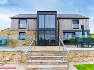 Internorm windows with sliding doors and powered shading