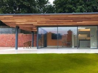 Cero slim profile sliding doors with open corner in a garden room
