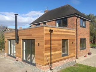 Refurbished Home with timber-clad extension | Internorm windows + Solarlux bifold doors