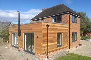 Refurbished Home with timber-clad extension | Internorm windows + Solarlux bifold doors