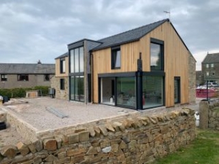 Internorm HF310 timber-aluminium windows with blinds - exterior - grey aluminium Internorm HF310 timber-aluminium windows with blinds - exterior - grey aluminium