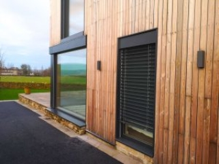 Internorm HF310 timber-aluminium windows with blinds - exterior - grey aluminium Internorm HF310 timber-aluminium windows with blinds - exterior - grey aluminium