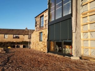 Internorm HF310 timber-aluminium windows with blinds - exterior - grey aluminium Internorm HF310 timber-aluminium windows with blinds - exterior - grey aluminium