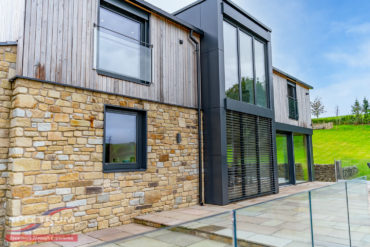 Internorm HF310 with external blinds timber/alu windows and juliet balcony