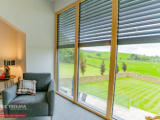 Internorm HF310 timber-aluminium fixed windows with external blinds - interior Internorm HF310 timber-aluminium fixed windows with external blinds - interior