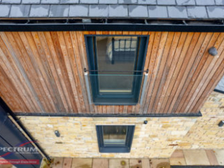 Internorm HF310 timber-aluminium tilt/turn windows - exterior - grey aluminium Internorm HF310 timber-aluminium tilt/turn windows - exterior - grey aluminium
