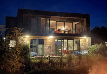Internorm windows in a contemporary self build home at night