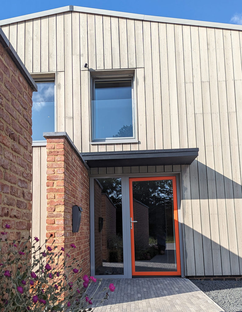 Internorm HT410 Entrance Door and Sidelight. Timber-Aluminium, triple-glazing.