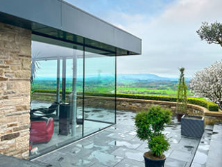 A Glass Box Style Extension in a Stone House overlooking the Ribble Valley