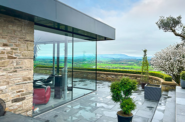A Glass Box Style Extension in a Stone House overlooking the Ribble Valley