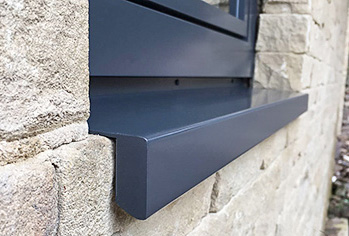 Kastrup Autumn Offer - an anthracite grey window cill supplied and fitted by Spectrum - closeup