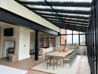 View of this big German-made glass extension towards the dining table and dining area