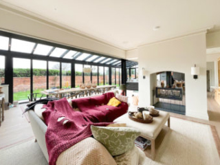 A view of this triple-glazed glass extension from the open-plan living area