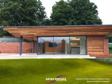 Cero slim-profile sliding doors in a Garden room in Buckinghamshire, installed by Spectrum