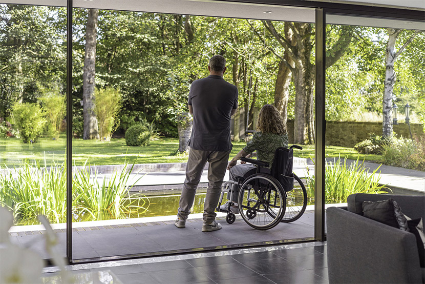 Solarlux Cero III sliding doors, tripled-glazed, with wheelchairfriendly threshold.